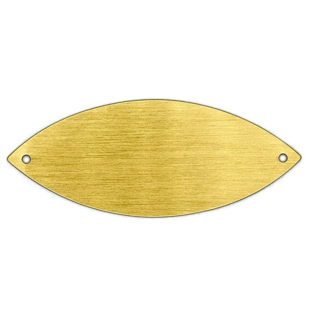 A Standard Brass Leaf used for engraving. It has a brass finish and a natural tree leaf shape, designed to be mounted on a plaque or donor tree with two small mounting holes