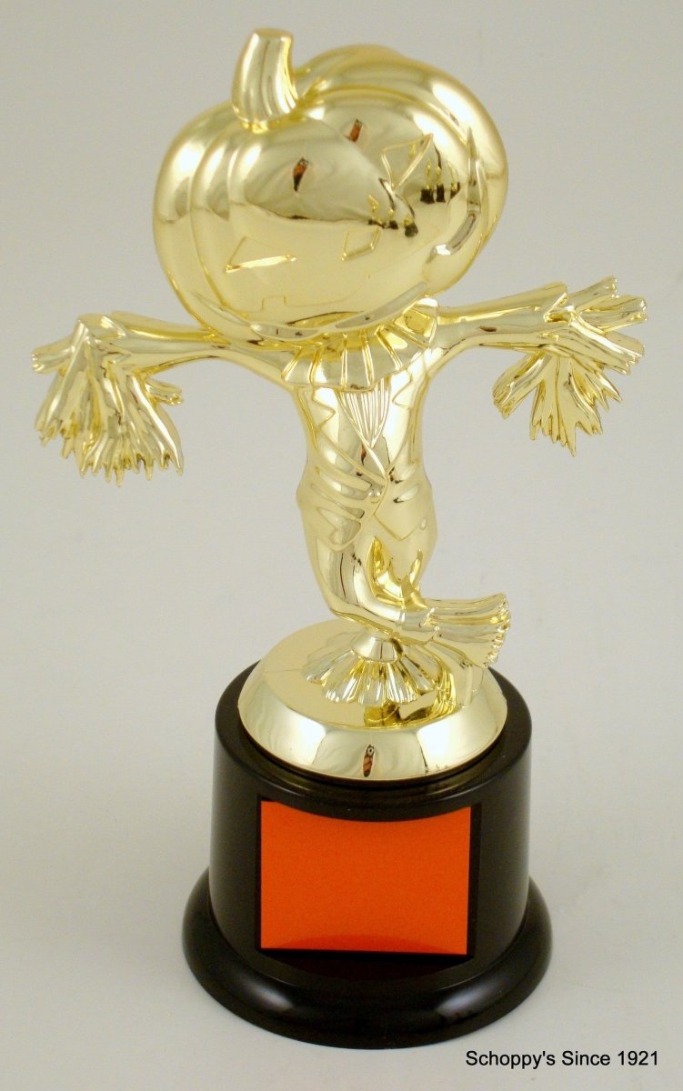 Pumpkin scarecrow figure trophy on a black round base