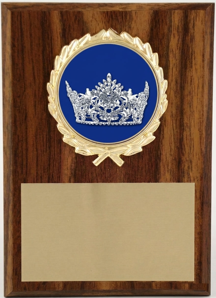 Schoppy's Pageant Seal Wood Look plaque shown in 5 by 7 size with Crown Logo on Blue background in wreath holder at top.
