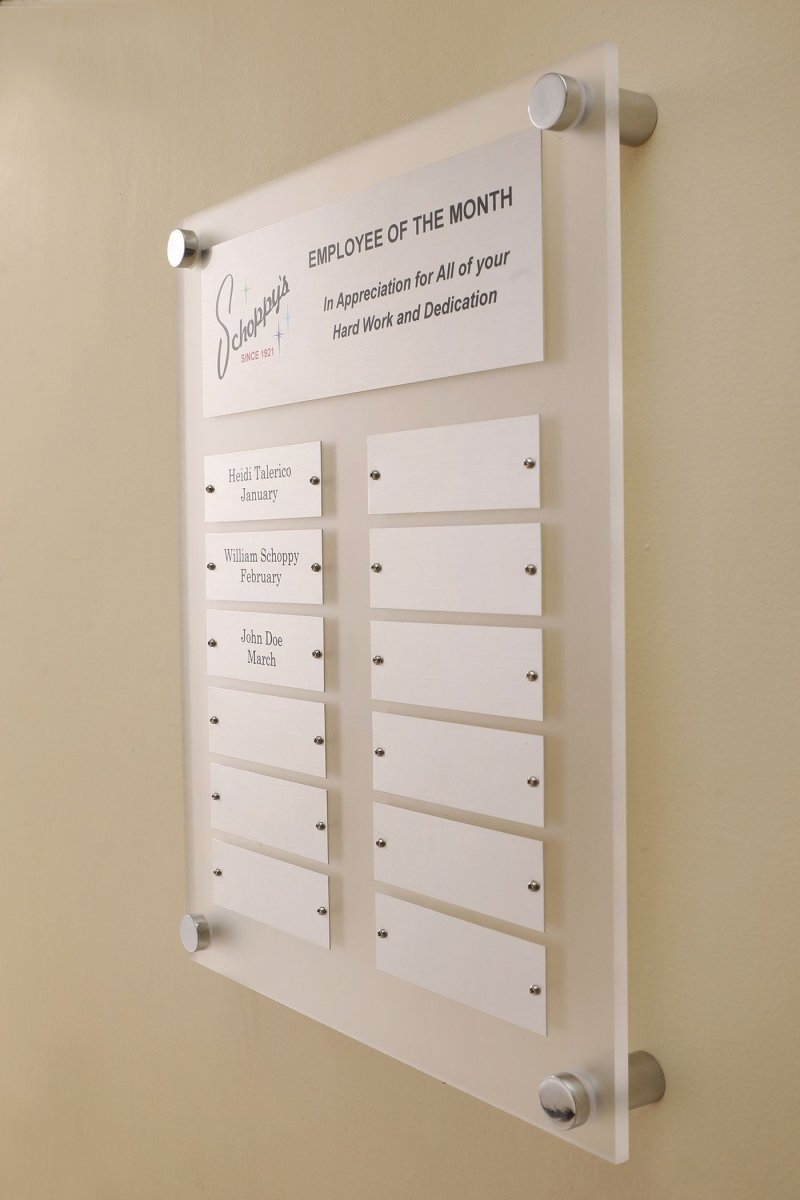 Side view of 12 by 15 inch frosted acrylic perpetual plaque with 12 Individual Silver engraving plates 