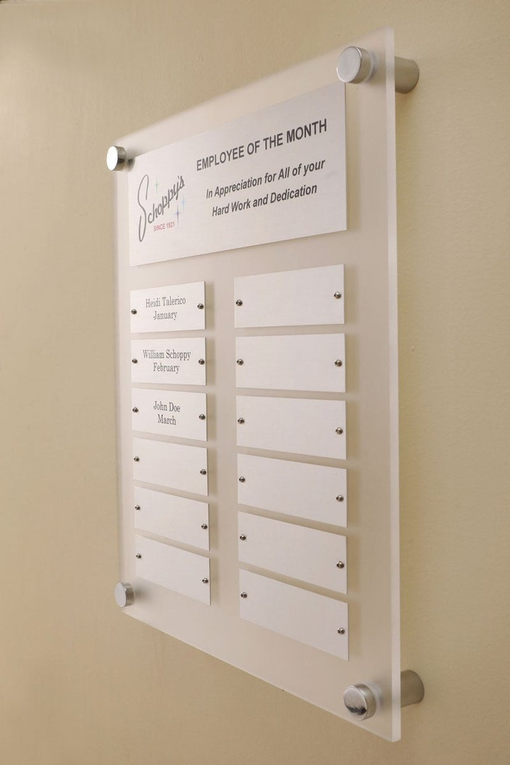 Side view of 12 by 15 inch frosted acrylic perpetual plaque with 12 Individual Silver engraving plates 