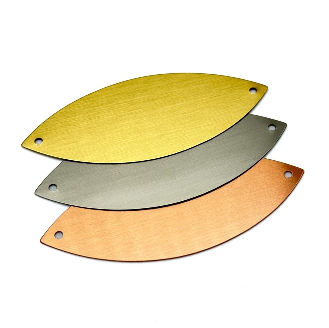 Three Standard Leaf engraving plates displayed in brass, silver, and bronze metallic finishes