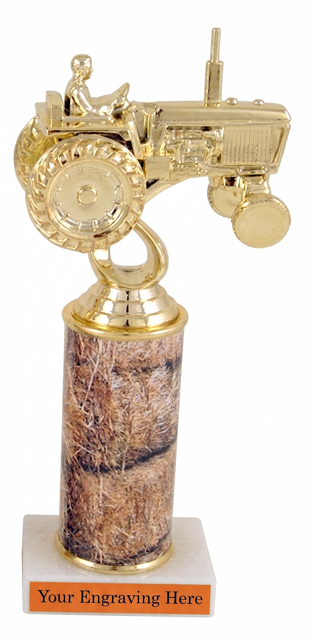 A tractor-shaped trophy with a shiny gold finish, mounted on a cylindrical base or Column with Hay Bale Images on the column sitting on a white marble base with Orange plate that reads &