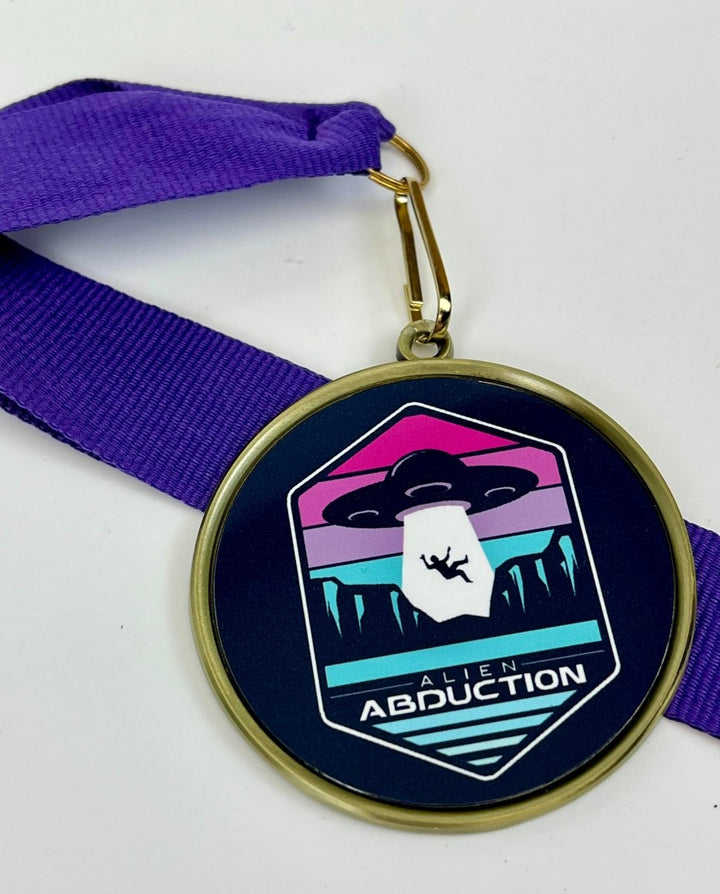 Alien Logo Medal - Schoppy's Since 1921