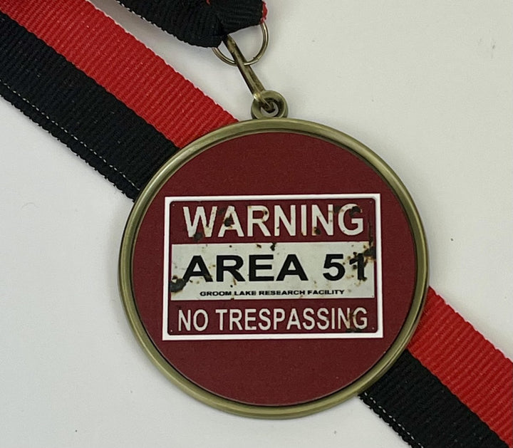 Alien Logo Medal - Schoppy's Since 1921