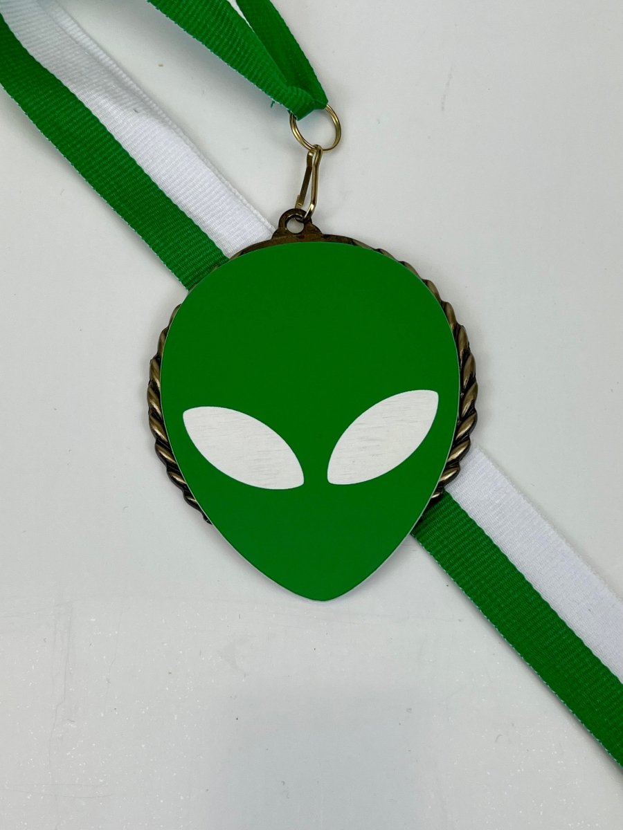 Alien Vector Cut Logo Medal - Schoppy's Since 1921