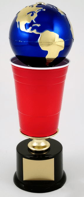 A novelty trophy featuring a blue and gold globe on top of a red plastic cup, mounted on a black round base with a gold plaque.