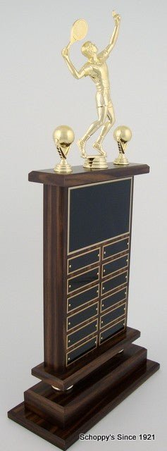 side view of A large Tennis Perpetual Trophy by Schoppy's. The trophy features a Large 8 inch Tennis Figure in a swinging position and comes with decorative tennis ball trim. The front of the base displays a large black laser-engraved heading plate, accompanied by 12 smaller individual plates for recording past winners